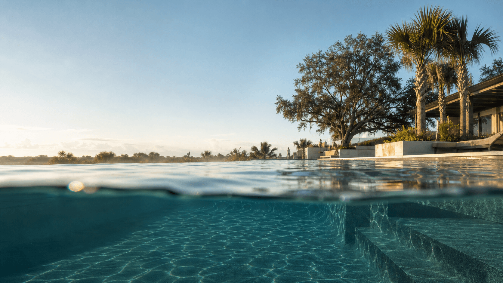 Conceptual Florida vacation-home lifestyle scene with a split waterline perspective